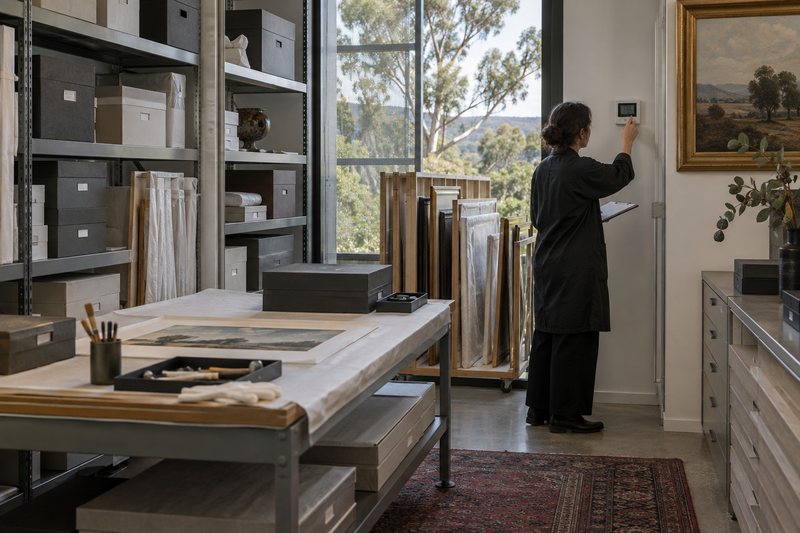An organised collection storage room with archival materials
